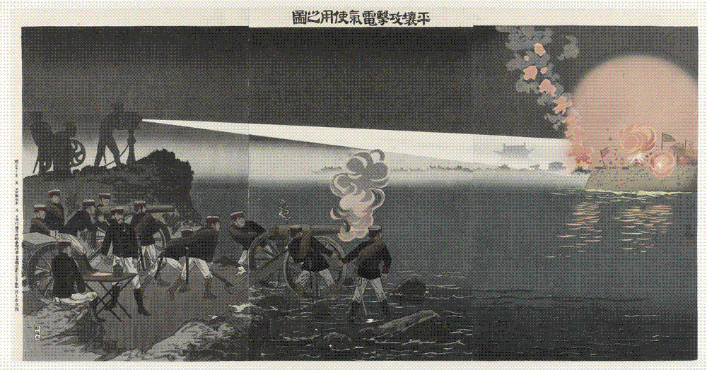 Japanese woodblock print triptych of a night battle: a white searchlight beam sweeps from left to right across dark water, gunners drag field cannon through the shallows in the foreground, and an enemy fort on the right explodes in orange fire.