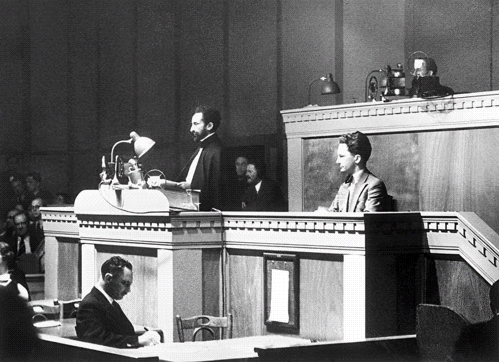 Photograph of Emperor Haile Selassie I standing at the rostrum of the League of Nations Assembly in Geneva in June 1936, delivering his appeal.
