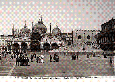 A mound of rubble where a great bell tower once stood, beside the arcades of St Mark's Square