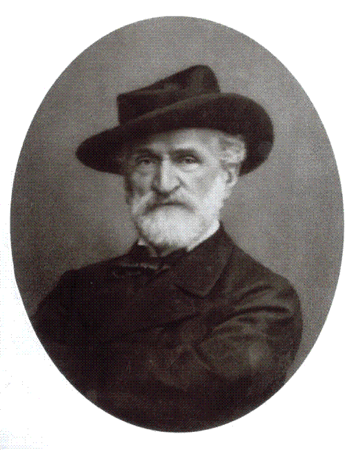 Sepia photographic portrait of an elderly bearded Giuseppe Verdi in a dark coat and top hat, seen in three-quarter view against a plain background.