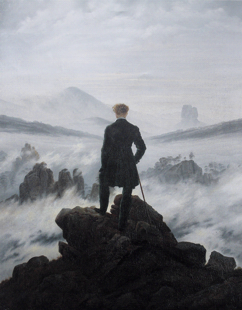 A man in a dark green coat stands on a dark crag with his back to the viewer, leaning on a cane, looking out over a vast sea of fog broken by jagged mountain peaks and receding ridges.