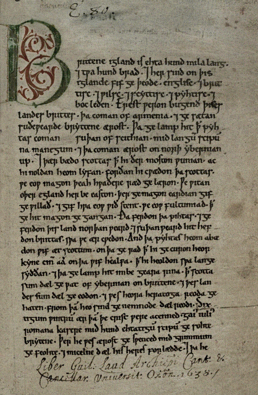 The opening page of a medieval manuscript written in Old English in brown ink, with a large decorated initial and ruled lines of script, the parchment stained and worn at the edges.